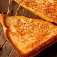 The American Grill · Locally sourced sourdough bread with our house secret sauce, swiss cheddar, jack, and gruyer...