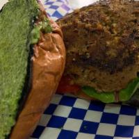 The Garden Burger · Homemade vegan patty (garlic, onions, carrots, mushrooms, herbs and spices), basil pesto, le...