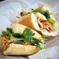 L14. Gourmet Vietnamese Sandwich · Choice of proteins with garlic mayo, shaved onion, pickled carrot & daikon, cucumber, jalape...