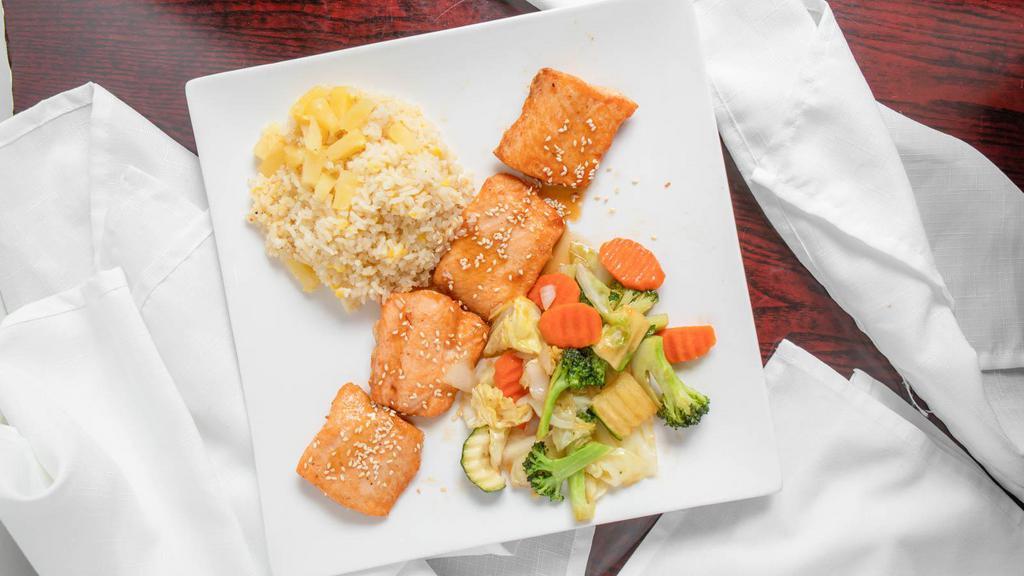 L7. Ginger Salmon · Seared salmon in ginger sauce, stir-fry vegetable, house special fried rice with pineapple.