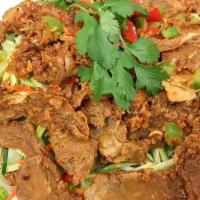 V14.Spicy Lemongrass Chicken · Our popular dish of vegetarian soy protein; cooked with lemongrass. Served with shredded zuc...
