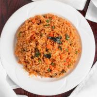 V8.Spicy Thai Fried Rice · Stir-fried rice with tofu, basil, carrots, peas, and spicy Thai seasonings.