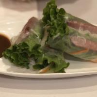 S7.Grilled Lemongrass Pork Rolls (2) · Grilled lemongrass pork, bean sprouts, lettuce & mint wrapped in fresh rice paper; peanut sa...