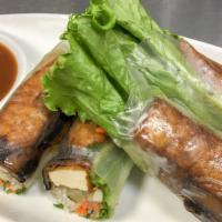 V3.Buddha Rolls (2) · Fresh rolls filled with sauteed tofu and mushroom, bean sprouts, lettuce, & mint wrapped in ...