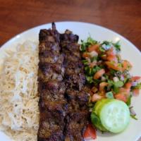Beef Shami Kabab · Two skewers of marinated ground beef with Basmati Rice (Kabuli Rice Option for additional $2...