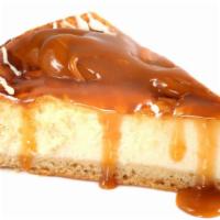 Burnt Caramel New York Cheesecake · Classic New York Style Cheesecake topped with scorched caramel chips.
