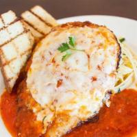 Chicken Parmigiana · Popular. Breast of chicken and Parmesan cheese with marinara sauce and fettucine.