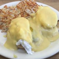 Crab Cakes Benedict · Grilled muffin topped with homemade crab cakes, poached eggs and hollandaise sauce.