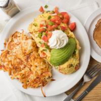 Mexicali Omelet (Most popular) · Vegetarian. Onions, tomatoes, bell peppers and Cheddar cheese topped with avocado, salsa, an...