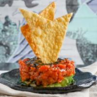 Tuna Tartare · Spicy tuna, avocado, chips and black tobiko.