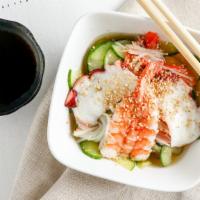 Seafood Sunomono · Octopus, shrimp and kanikama cucumber salad.