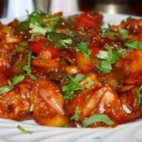 Chilli Chicken Momos · Pan fried dumplings toasted in schezwan chilli sauce