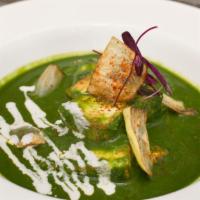 Saag Paneer · Vegetarian dish originating from the Indian subcontinent, consisting of paneer (Indian chees...
