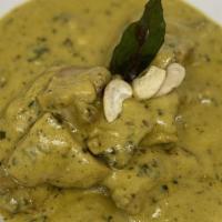 Chicken Korma · chicken cooked in a thick gravy of cashew, raisins, and onion with mild spices.