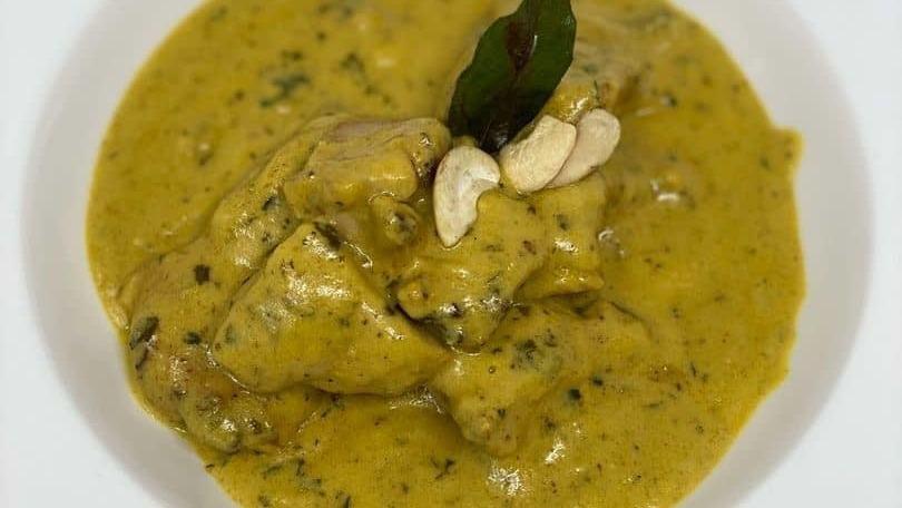 Lamb Korma · Lamb cooked in a thick gravy of cashew, raisins, and onion with mild spices.