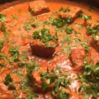 Salmon Tikka Masala · Salmon fillet cooked in onion and tomato curry sauce