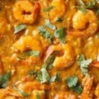 Shrimp Tikka Masala · Black tiger shrimp prepared in a thick creamy tomato sauce with Indian spices.
