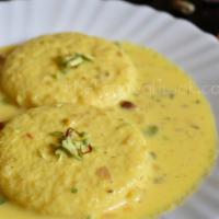 Pistachio Rasmalai · Cottage cheese petty soaked in cardamom milk with crushed pistachio
