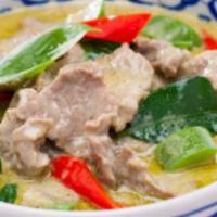green curry beef  · over rice , green curry with egg plants, thai basil, and bell pepper
