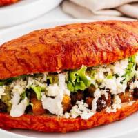 Pambazos · Meat, cheese, lettuce, avocado, cream, salsa, onion and cilantro