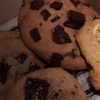 3 Chocolate cookies w/ White chocolate chips per pack. · 