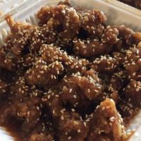 Sesame Beef · Spicy. Deep fried breaded beef in spicy garlic sauce sprinkled with toasted sesame seeds.