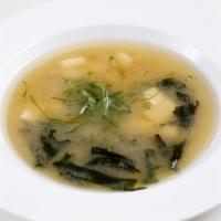 Miso Soup · Served with scallion, wakame seaweed and silken tofu.