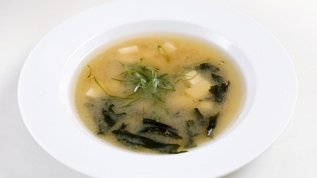Miso Soup · Served with scallion, wakame seaweed and silken tofu.
