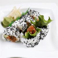 Spicy Roll · Choice of spicy tuna or spicy yellowtail with avocado. Roll with sesame seed.