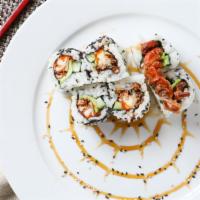 Spider Roll · Soft shell crab, avocado and cucumber. Roll with sesame seed.
