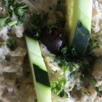 Baba Ghanoush · Gluten-free, vegetarian. Smoked eggplant, imported tahini, mint, garlic, lemon with extra vi...