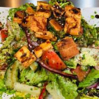 Fattoush Salad · Vegan, vegetarian. Romaine hearts, cucumber, tomato, red onion, bell peppers, sumac, parsley...