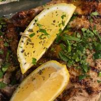 Chicken Lemonato · One-half free range chicken marinated with fresh lemon, olive oil, oregano, and grilled. Ser...
