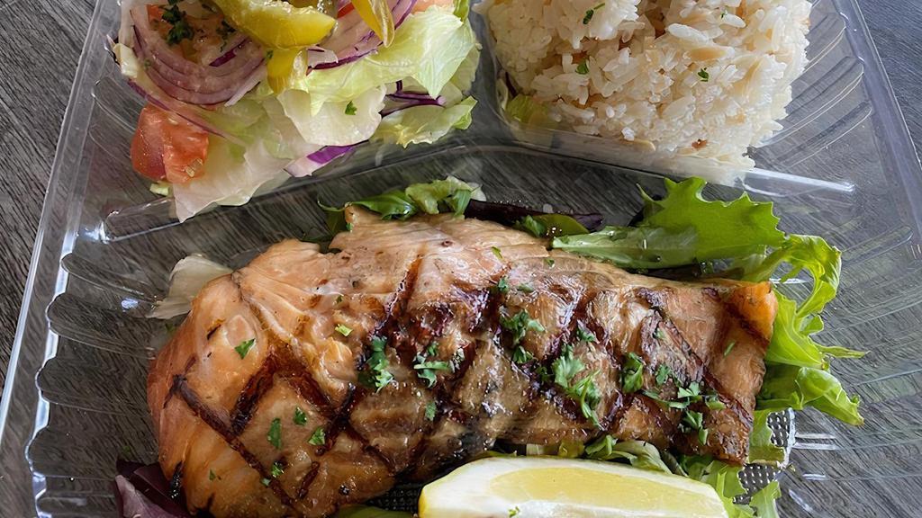 Grilled Salmon · Grilled salmon served w/rice with orzo and house salad