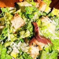 Chicken Caesar Salad · A Classic. Shredded rotisserie chicken,  parmesan, Imported Anchovy, Garlic, Dijon Mustard, ...
