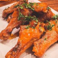 Spicy Chicken Wings · Served with carrots, celery and blue cheese ranch.