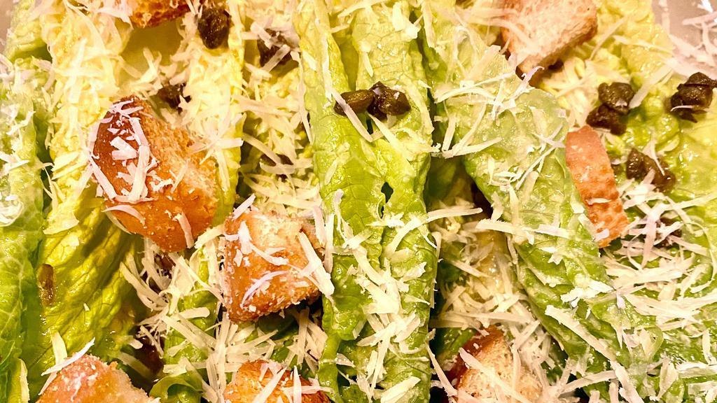 Caesar Salad · Organic gem of romaine, Caesar dressing (Spanish anchovies, extra virgin olive oil, parmigiano reggiano, acme croutons and fried capers).
