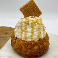 Melted Caramel · Caramel custard topped with fresh whipped cream and caramel waffle.