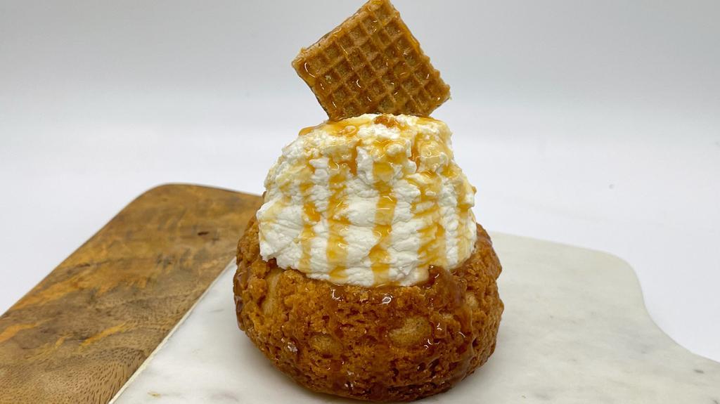 Melted Caramel · Caramel custard topped with fresh whipped cream and caramel waffle.
