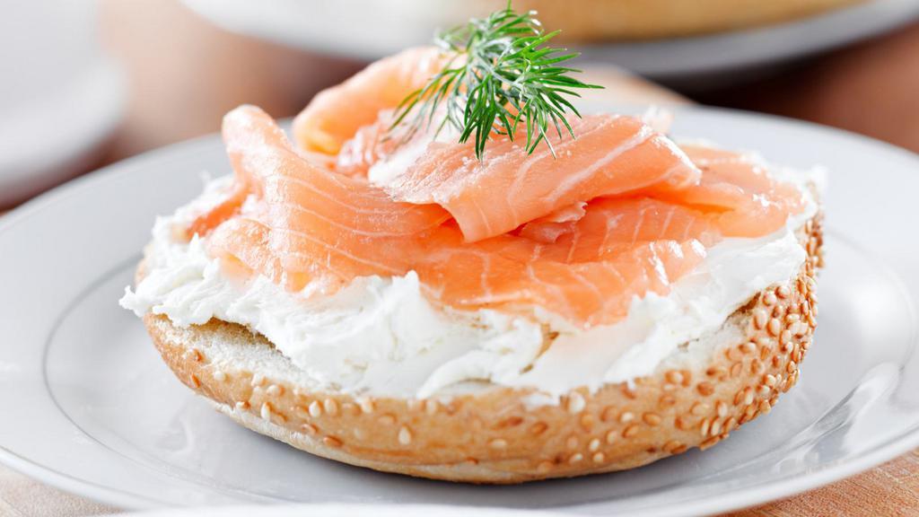 The Lox Bagel · Smoked salmon, cream cheese, onions, tomatoes, and capers in between a fresh bagel.