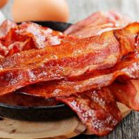 Bacon (4) · Four strips of crispy bacon.