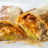 California Sunshine Burrito · Scrambled eggs, avocado, turkey bacon, and cheddar cheese wrapped in a fresh made tortilla.