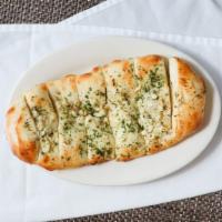 Napoli Breadsticks · We use our freshly made dough and portion out six pieces and cook to golden brown and top wi...