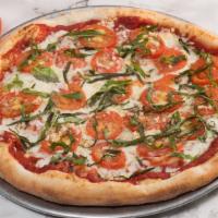 Margherita · An international classic with a Vallejo twist. 
 Pizza sauce, mozzarella cheese, basil, toma...