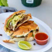 Tortas · it has Meat,Cheese,Onion,Lettuces,Sour cream,Salsa ,Avocato And Jalapeno
