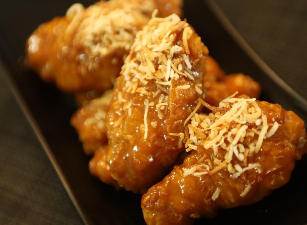 Wings Medium (12 Pcs) · Served with Lava Pickles.
