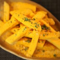 Pixie Dust Cheddar Fries · French Fries w/House-Made Cheddar Cheese & Savory Dust.