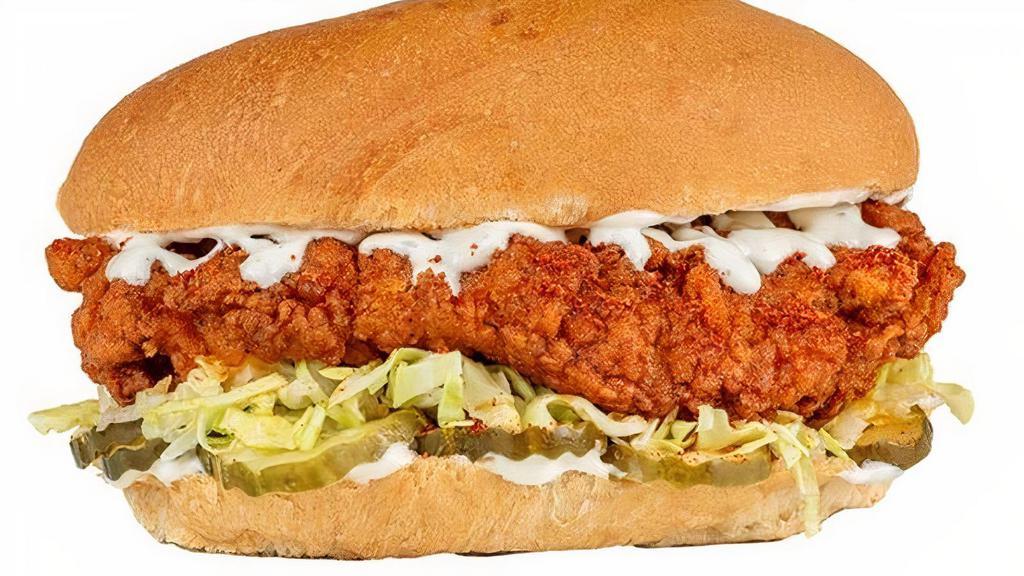 Nashville Hotbird®  · Nashville Hot Crispy Chicken, classic slaw, dill pickles, mayo, Greek Yogurt Ranch