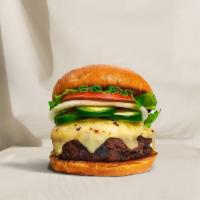 Java Jalapeno Vegan Burger · Seasoned Beyond Meat patty topped with melted vegan cheese, jalapenos, lettuce, tomato, onio...