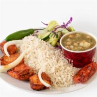 Chicken Kabob · Charbroiled skewer of chicken breast marinated in our special seasoning ,served with basmati...